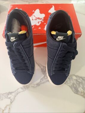 Nike Navy and White High-Top Canvas Sneakers with Yellow Tongue Accent